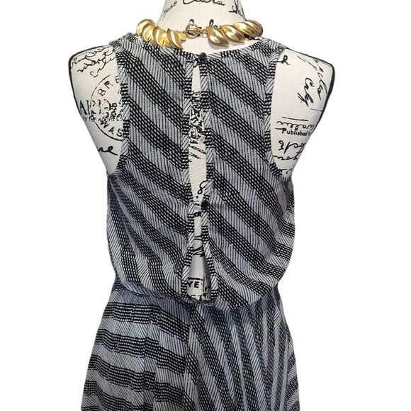 Pleated Front Panel Hankerchief dress With Semi Open Back - Picture 3 of 7